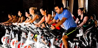 The Refinery Hotel's new wellness program includes pop-up fitness classes such as cycling.