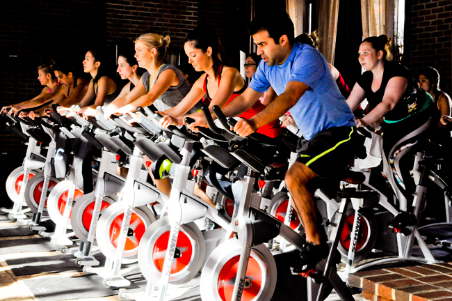 The Refinery Hotel's new wellness program includes pop-up fitness classes such as cycling.