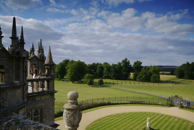 View of Burghley House's formal gardens and surrounding parkland. The landscaping and designs were created by Capability Brown in 1775-80.