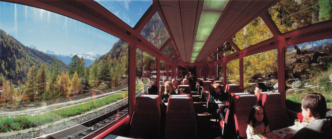 Guests enjoy panoramic views on the Glacier Express.
