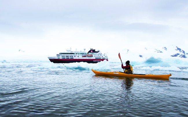 Kayaking in Antarctica is one of the many thrills for guests when sailing with Hurtigruten. 