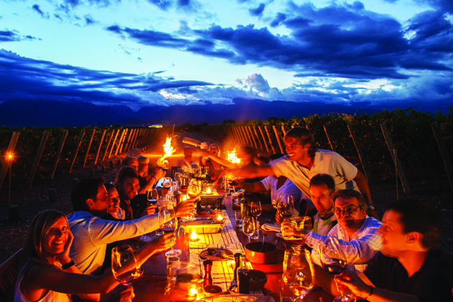 Opposite page: Dining al fresco at The Vines Resort & Spa in Chile.