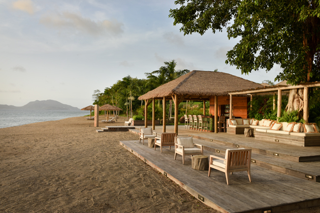 Guests can enjoy a mango-infused cocktail at Paradise Beach Nevis' Beach Bar. 