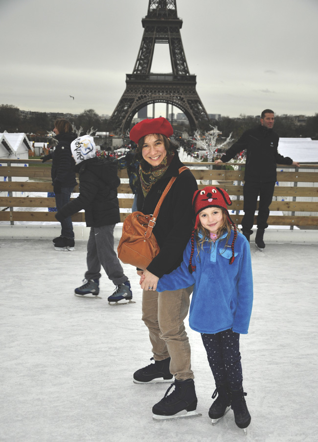 Jennifer with one of her children, ice skating in Paris.