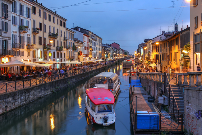 Evening scene along the Naviglio Grande canal in Milan with Discover Your Italy. (Discover Your Italy.)