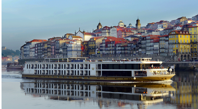 The Amavida cruising the Douro River in Porto, Portugal.