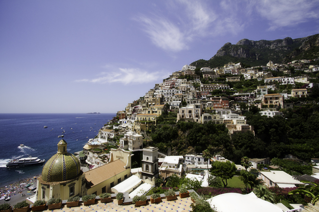 Azamara Club Cruises double upgrade deal allows guest to receive a complimentary double upgrade from a Club Interior to Club Veranda stateroom on select sailings. Amalfi, Italy (pictured).