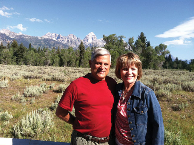 John and his wife touring the Grand Tetons. (Photo courtesy of Mayflower Tours.)