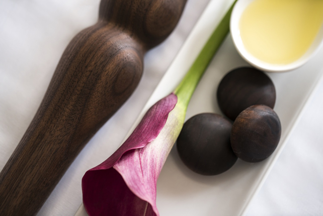 The Ritz-Carlton, St. Louis' indigenous therapies include the Missouri Black Walnut Massage, which uses sticks carved from locally sourced black walnut.