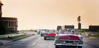While in Cuba, travelers can ride around in vintage cars. (Photo courtesy of Travel Impressions.)