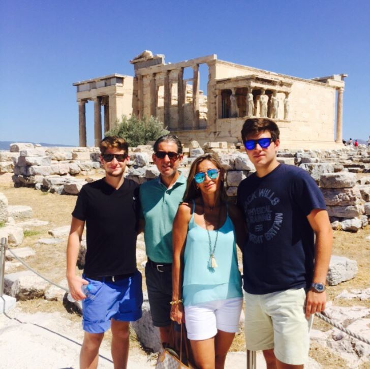 Andre traveling with his family in Greece.