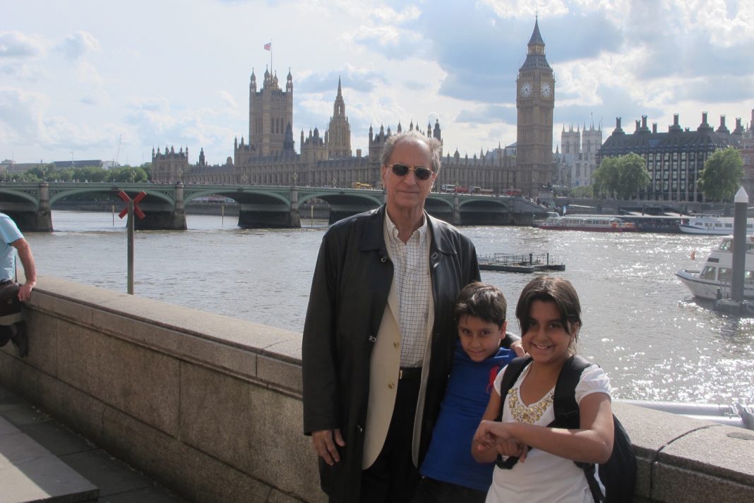 John in London with his grandchildren.