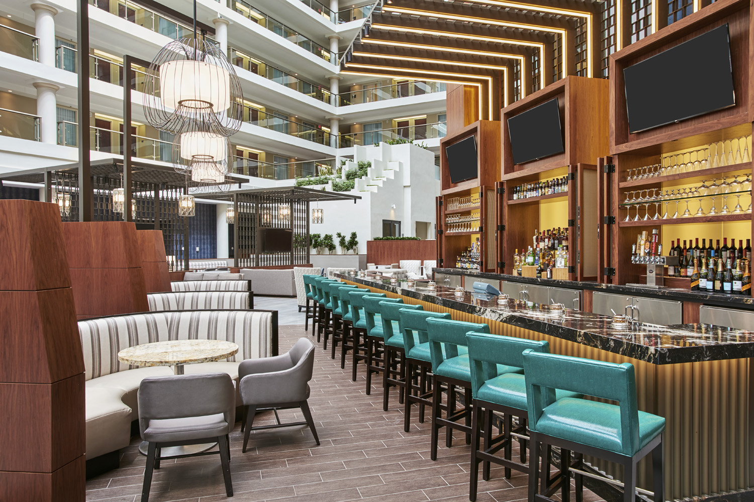 The District Tap restaurant at the Embassy Suites by Hilton Washington DC Georgetown is the ideal spot for a night cap after a day of exploring the area's bustling food scene. 