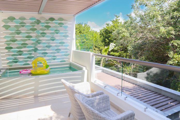 Signature Eco Junior Suite accommodations at Sandos Caracol Eco Resort in Riviera Maya.