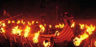 More than 800 Vikings join a massive dragon ship set ablaze by flying torches for Scotland's Up Helly Aa Festival in January. (Photo credit: Visit Scotland)