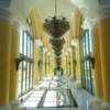 Each and every public space at the resort features thoughtful decor such as the chandeliers in this hallway.