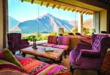 A lobby with a view at Inkaterra Hacienda Urubamba in the Sacred Valley.