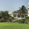 Exterior view of the stately Hyatt Ziva Rose Hall lobby building in Montego Bay, Jamaica.