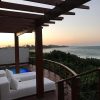 White Pearl Resorts lies along the beach in southern Mozambique, with 21 hilltop suites sitting on stilts overlooking the sea.