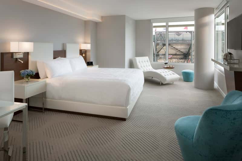 A rendering of a guestroom at the tech-driven Hotel VIA in San Francisco.