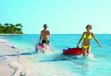 Couples can enjoy a variety of watersports at Secrets Cap Cana.