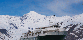 Snowy mountain views are a part of any springtime cruise through Alaska, and now, lower fares are, too.