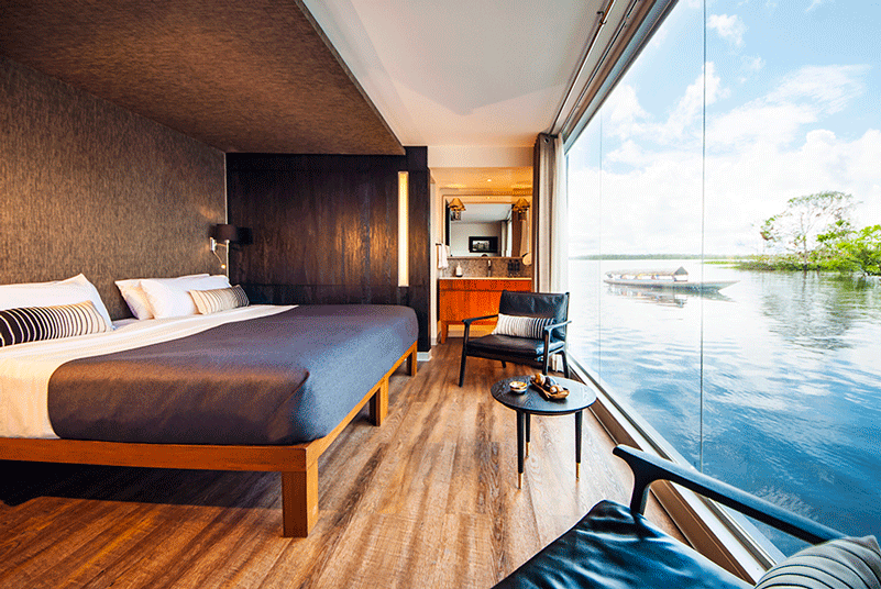 Spacious suites and floor-to-ceiling windows give guests perfect views of the Amazon River.