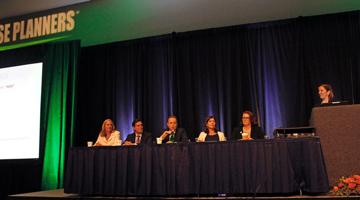 Vicky Garcia leading a panel discussion during Cruise Planners' Luxury Forum. Photo courtesy of Cruise Planners.)