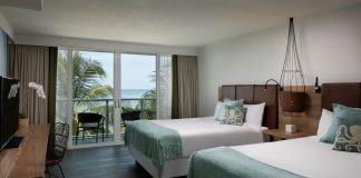 The Double Queen Ocean View Guestroom at Amara Cay Resort.