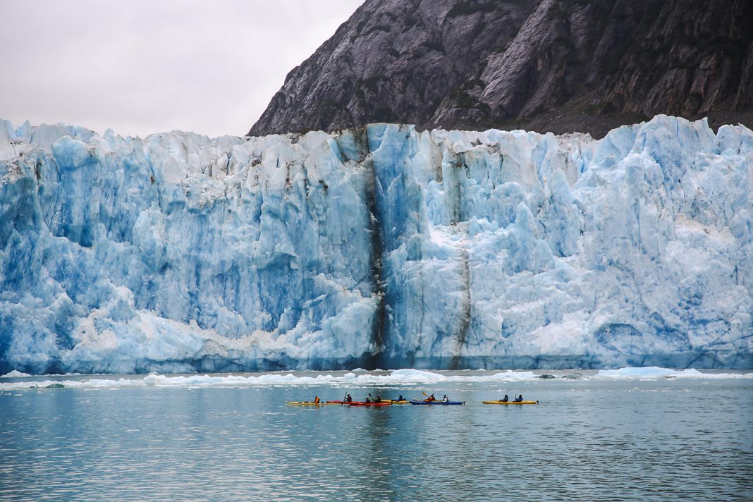 Guests on an UnCruise Adventures voyage in Alaska can explore the area on a kayak.