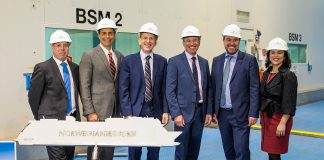 Executives from Norwegian Cruise Line Holdings and MEYER WERFT at the steel cutting for the cruise line's newest ship.