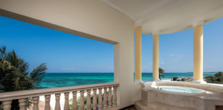 The oceanfront suite offers a spacious terrace with views of paradise.