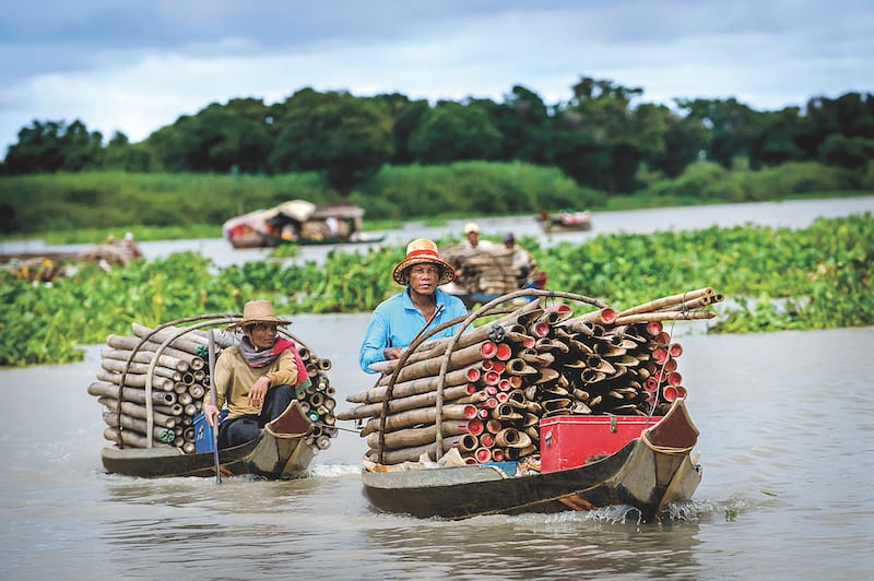 Bamboo vendors on the Mekong River
